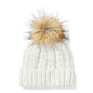 Berretto da donna con pon pon e toppa  in pelle