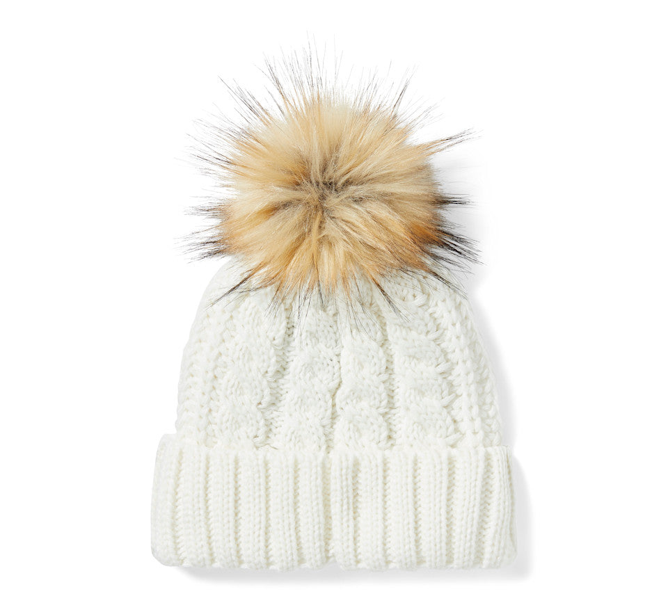 Berretto da donna con pon pon e toppa  in pelle